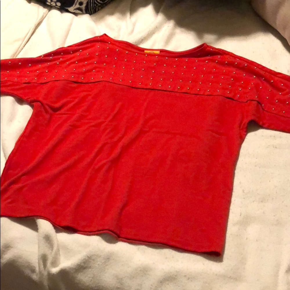 Red blouse with studded chest